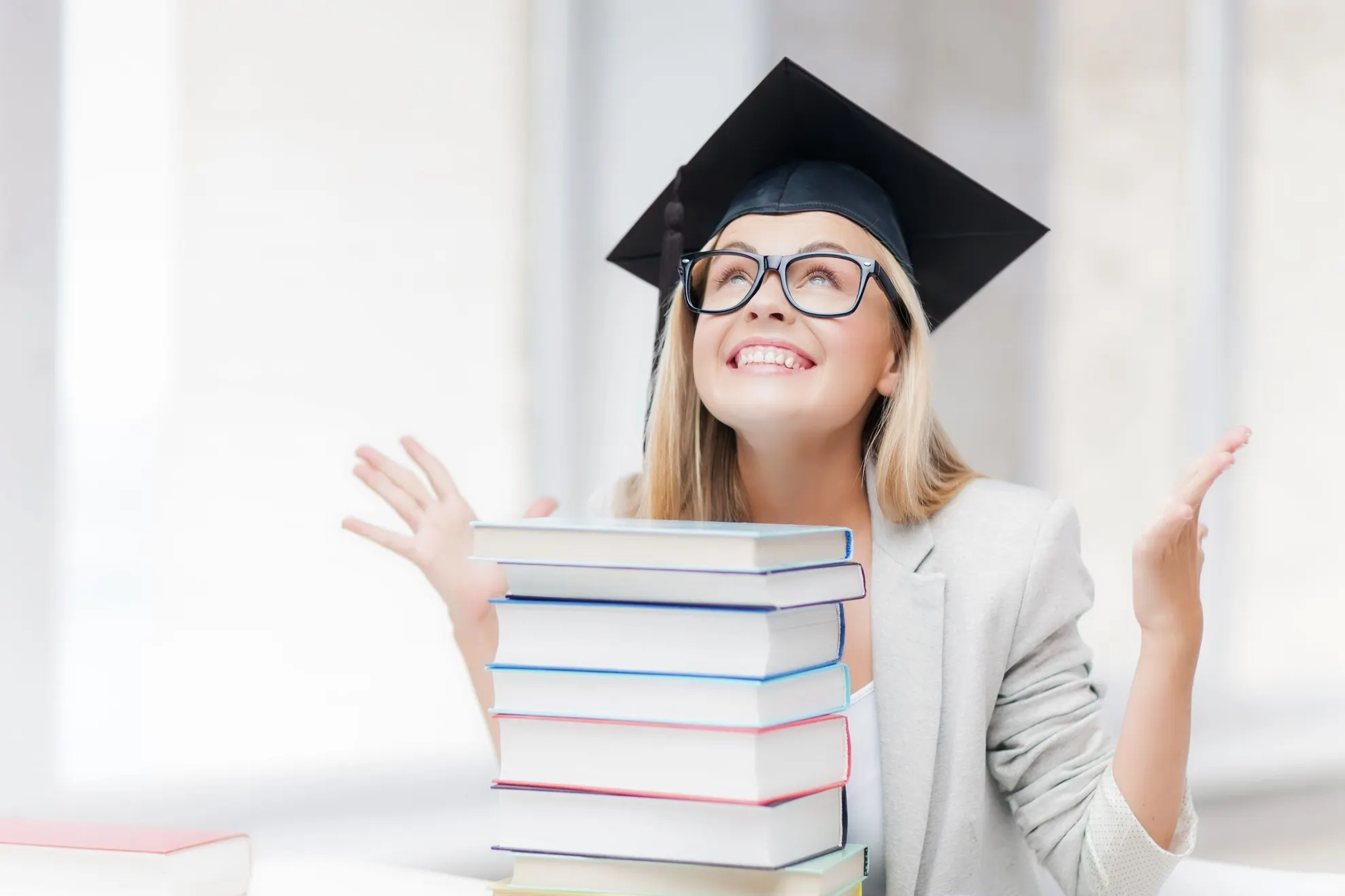 absolventi