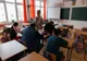 Mamă și fiu în clasa a patra, într-o școală din Covasna. „Am primit încă o șansă. Nici la mătură nu ne angajează fără școală”