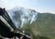 Pădurea de la Oituz arde de 4 zile. O aeronavă a forțelor aeriene îi ajută și astăzi pe pompieri